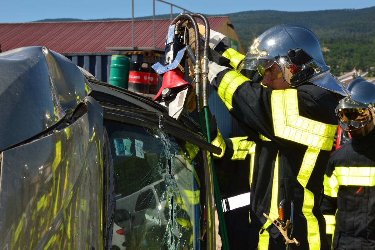 Firefighter Cutting Car Wreck