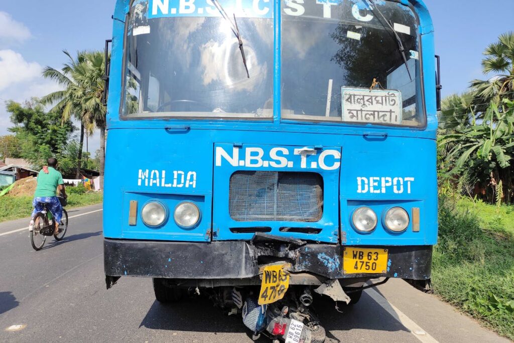 Blue and White Bus on Road