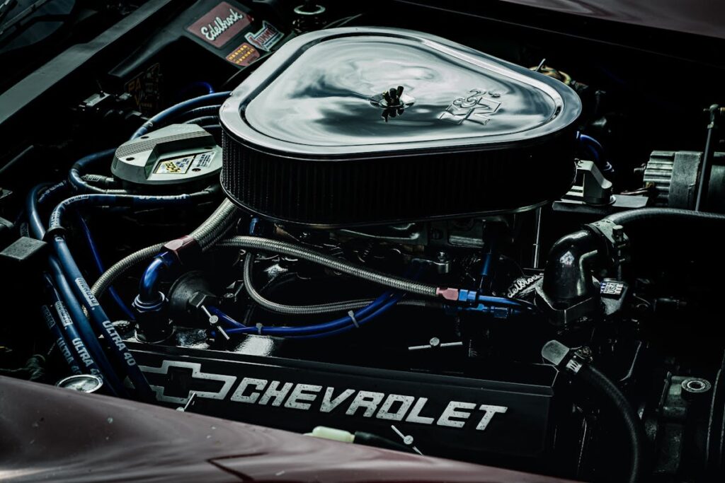 Detailed close-up of a Chevrolet engine showcasing performance parts and intricate mechanics.