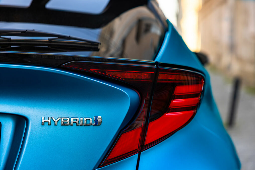Lviv, Ukraine - July 15, 2023: Closeup of blue Toyota C-HR Hybrid