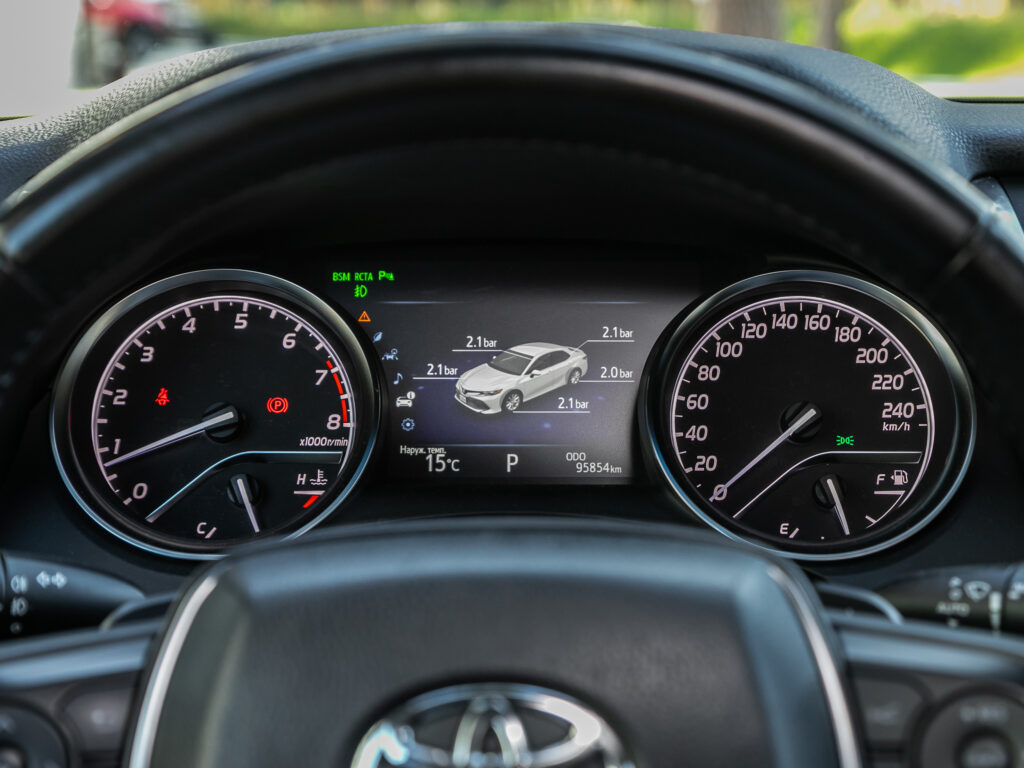 Novosibirsk, Russia - October 11 , 2023: Toyota Camry,Dashboard closeup with visible speedometer and fuel level. Odometer, tachometer. Car detailing